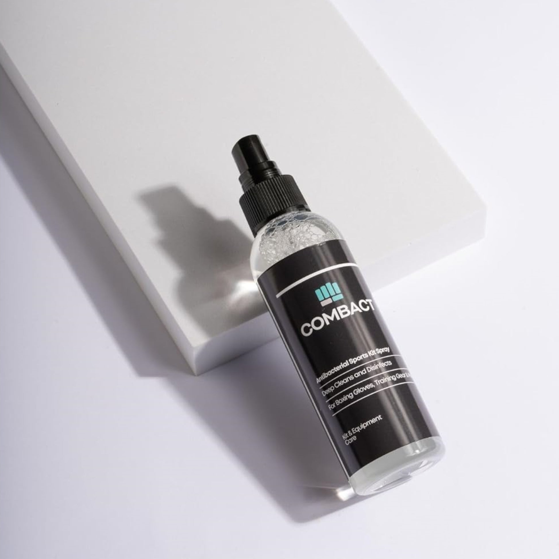 Professional product photograph of the Combact Antibacterial Sports Kit Spray used to deodorise boxing gloves.