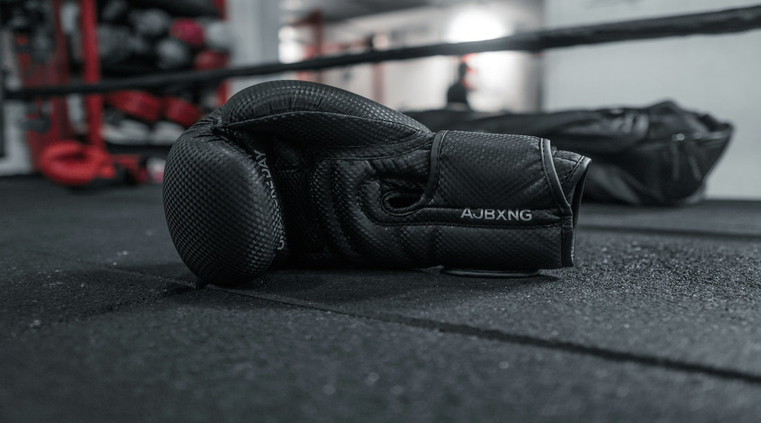 Image of a Pair of boxing gloves that have been cleaned by Combact care products. 